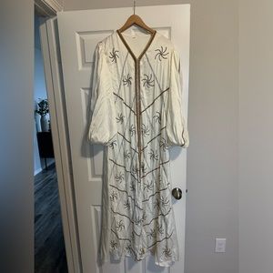 White dress with gold beading